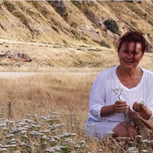 Elena Turner with field of yarrow (Achillea millefolium)