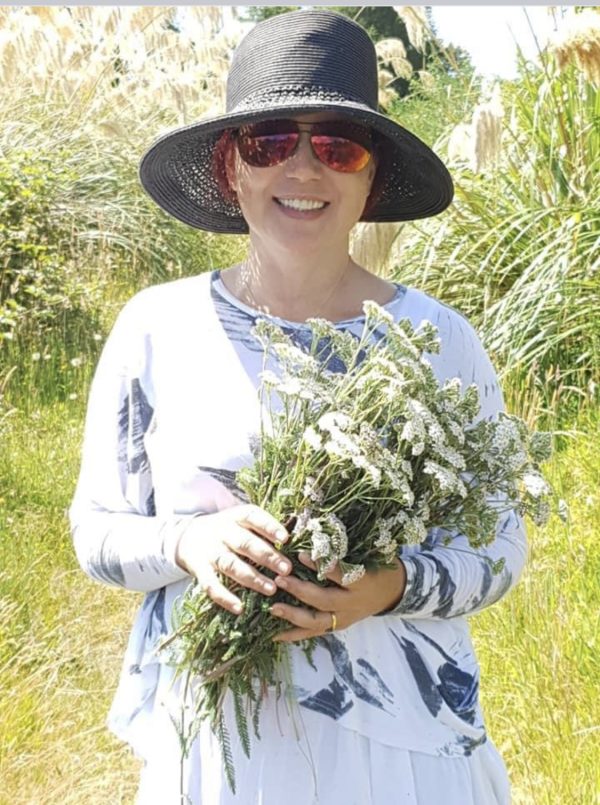 Elena Turner with yarrow (Achillea millefolium)